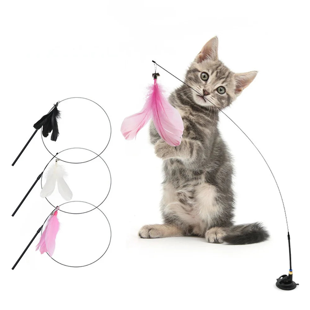 Interactive cat teaser toy with feathers, bell, and suction cup